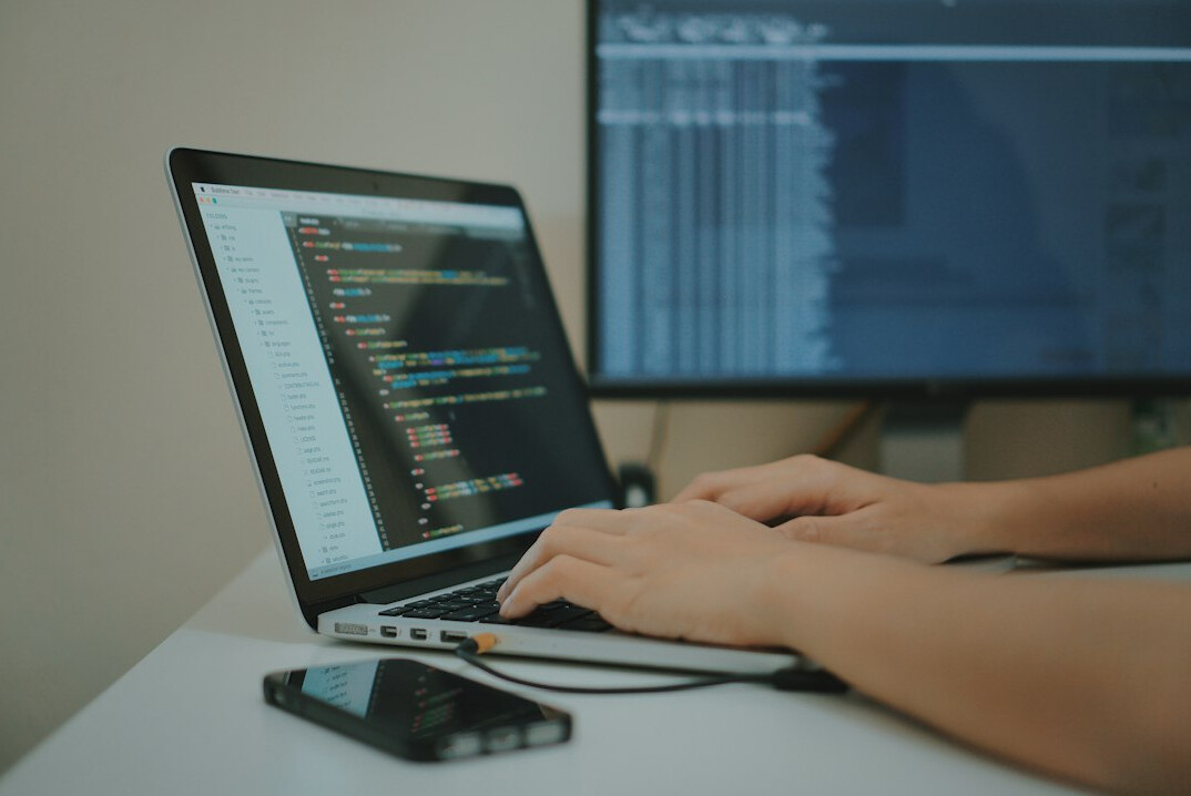 young programmer at desk