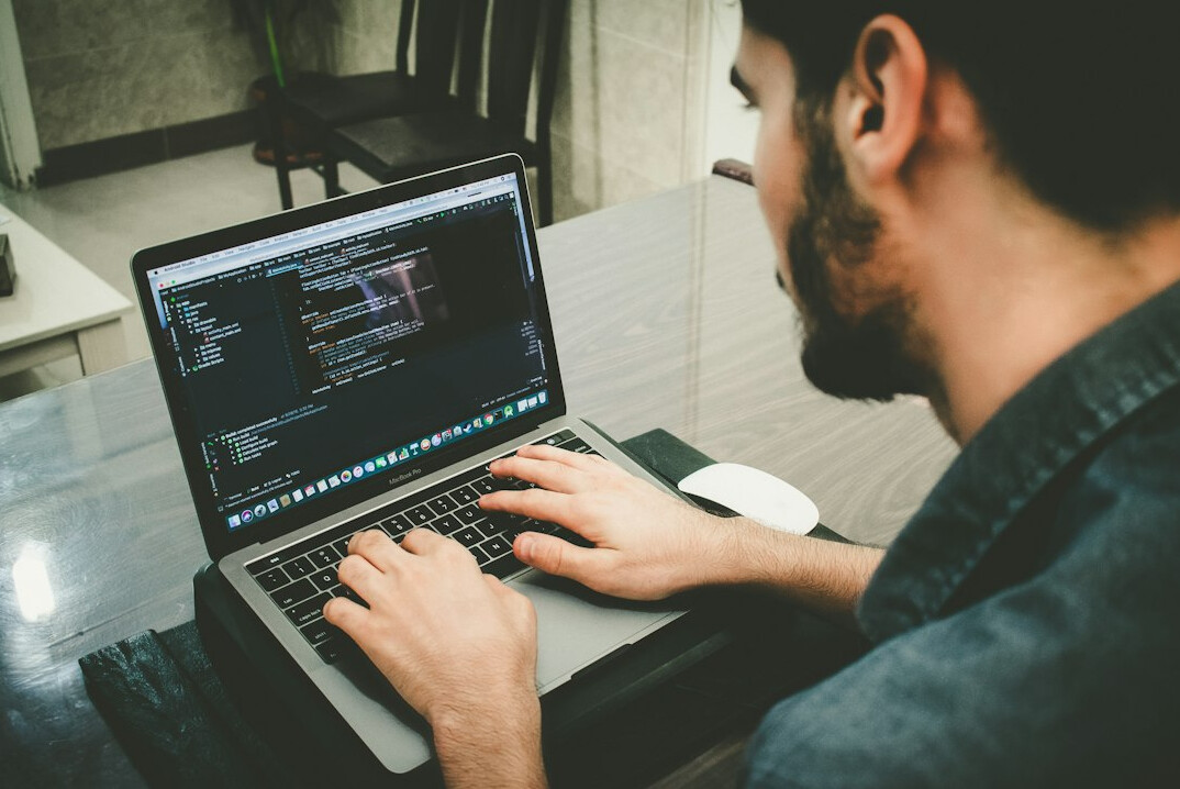 coding on laptop
